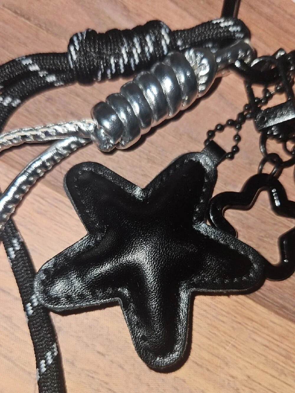 Black Star Charm Keychain with Metallic Accents